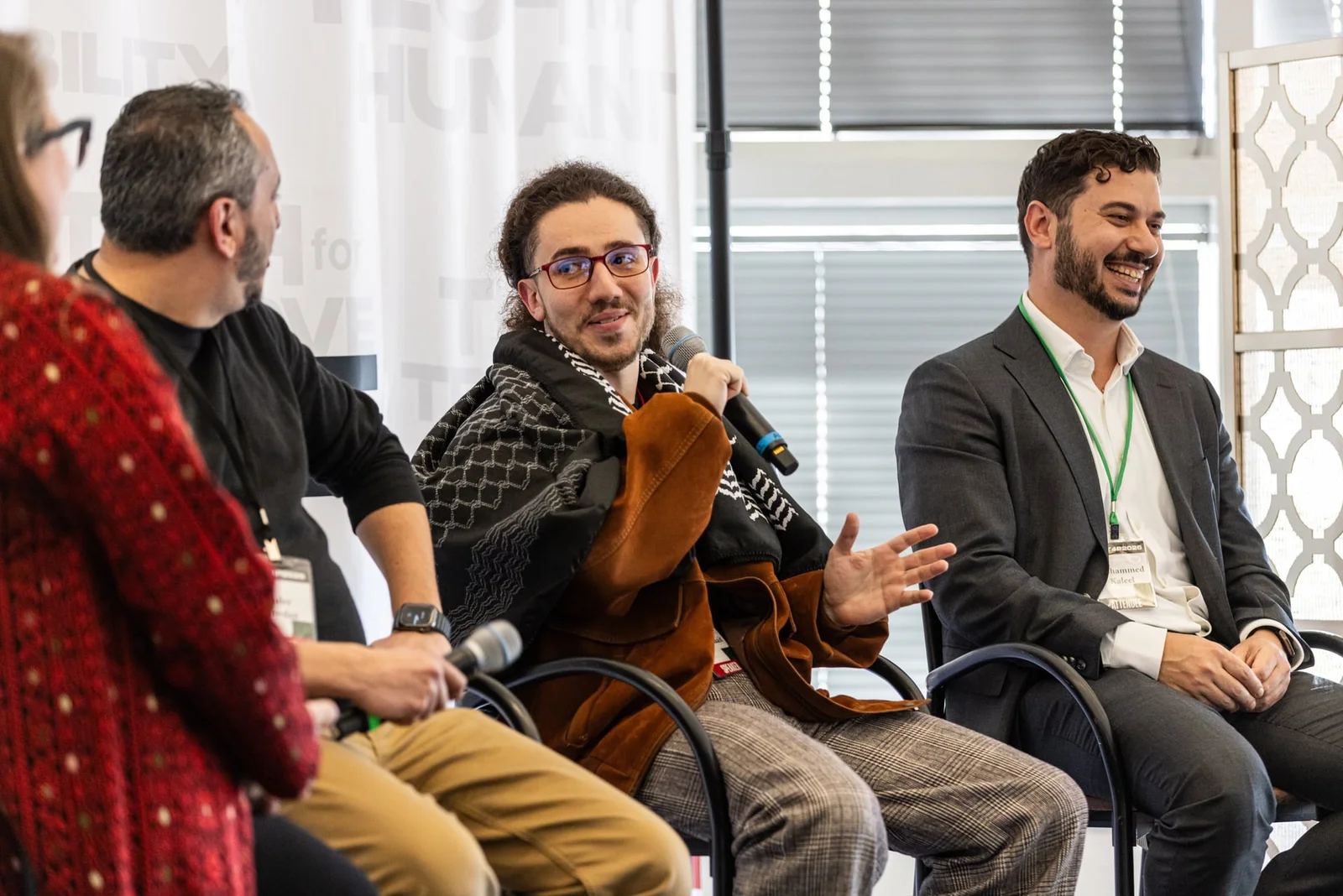 A Tech for Palestine member speaking on a panel at a community event